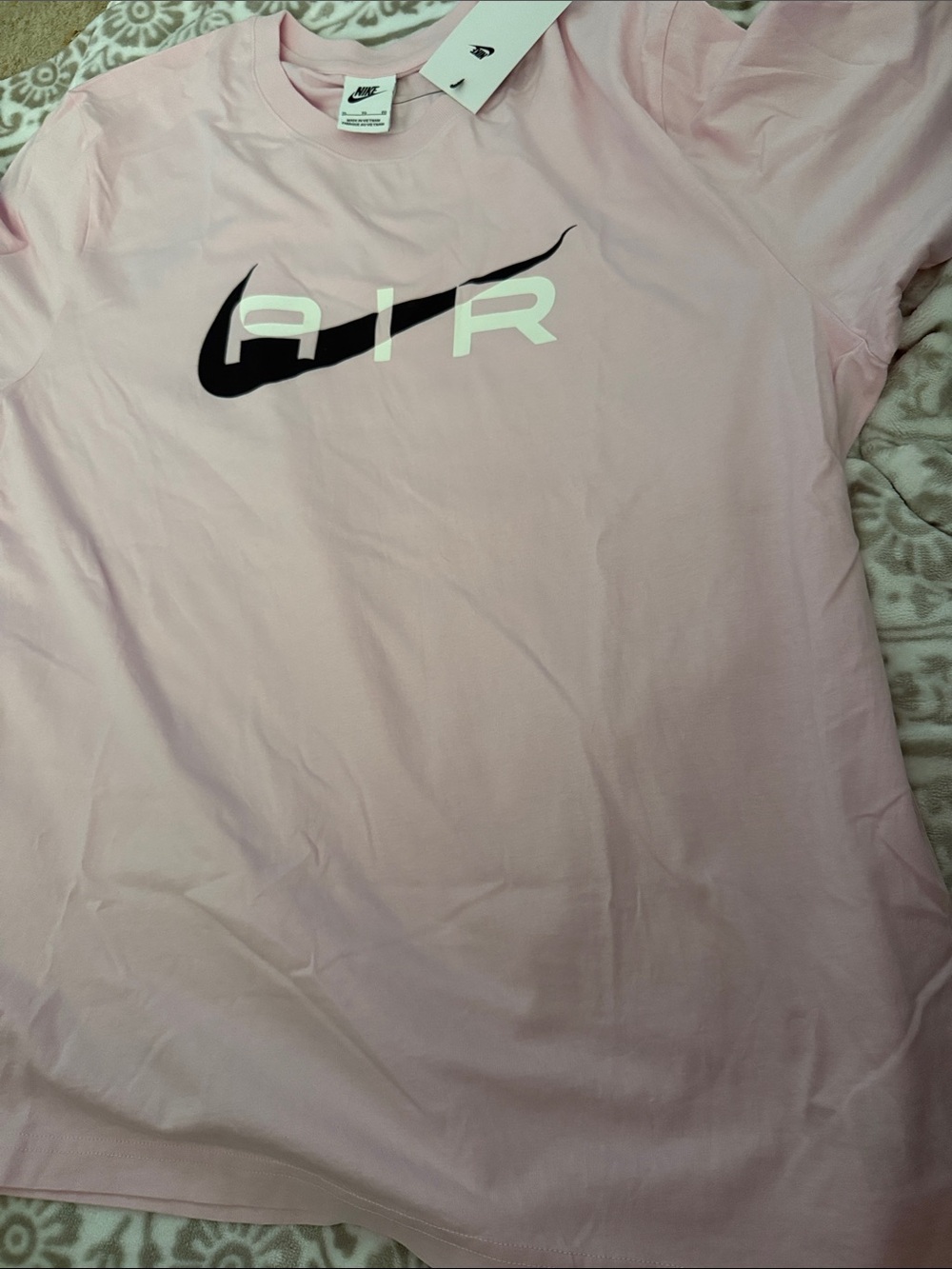 Nike AIR Short Sleeve Tee in Light Pink with Black Swoosh